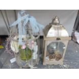 TWO VINTAGE STYLE DECORATIVE LANTERNS.