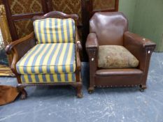 A LEATHER UPHOLSTERED ART DECO CLUB ARM CHAIR AND A BERGERE ARM CHAIR.