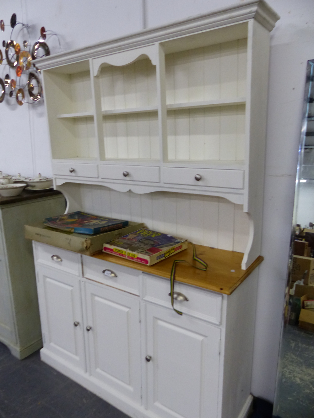 A PAINTED PINE DRESSER.