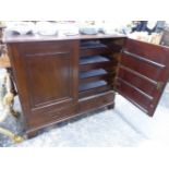 A LATE VICTORIAN MAHOGANY LOW LINEN PRESS CABINET.