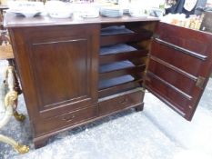 A LATE VICTORIAN MAHOGANY LOW LINEN PRESS CABINET.