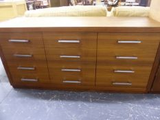 A GOOD QUALITY BESPOKE WALNUT DESIGNER SIDE CABINET WITH THREE DOORS AND ALLOY HANDLE FITTINGS. W