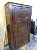 AN 18TH C. AND LATER OAK HALL CABINET WITH FIELDED PANEL SIDES AND DOORS. W 103 X D 50 X H 193CMS.