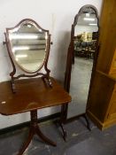 A SMALL MAHOGANY FRAMED CHEVAL MIRROR, A SHIELD FORM SWING MIRROR, AND A TRIPOD TABLE.