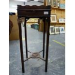 AN ANTIQUE STYLE MAHOGANY URN STAND WITH CUP SLIDE.
