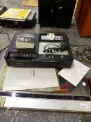 A SHARP STEREO MUSIC CENTRE, A GOODMANS TAPE PLAYER AND AN AIWA TAPE PLAYER (3).
