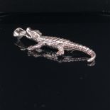 SILVER JOINTED CROCODILE PENDANT, WITH ARTICULATED ARMS AND LEGS, AND SCALES UPPER AND LOWER BODY.