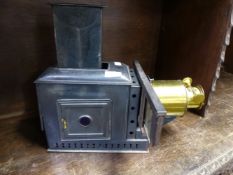 AN ANTIQUE MAGIC LANTERN.