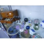 FOURTEEN GLASS PAPERWEIGHTS, A THREE DRAWER COLLECTOR'S CHEST, BADGES, ETC.