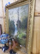 A GILT FRMAED OIL ON CANVAS, FIGURES BY RIVERSIDE. THE PAINTING 70 X 90CMS, THE FRAME 95 X 118CMS.