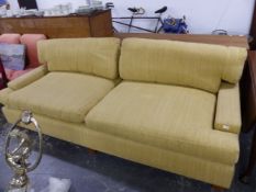 A VERY LARGE GOLD CORDUROY UPHOLSTERED SETTEE. W 253 X D APPROX 110 X HEIGHT AT THE BACK 81CMS.