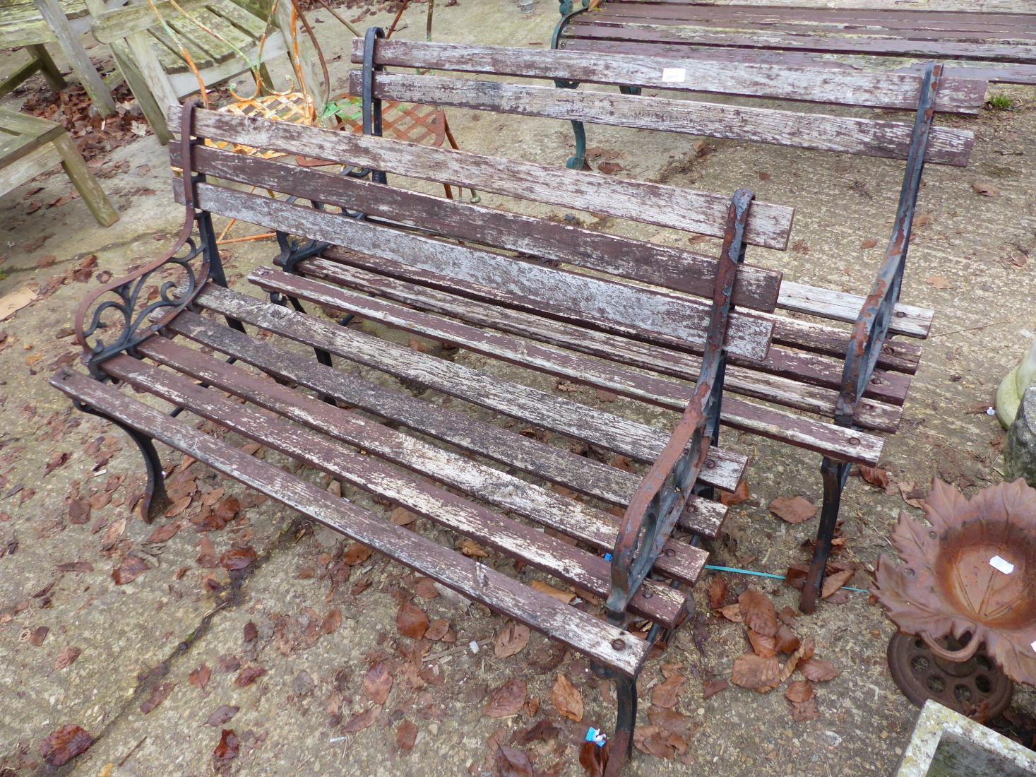 A PAIR OF GARDEN BENCHES.