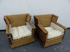 A PAIR OF LARGE WING BACK CLUB ARMCHAIRS FOR UPHOLSTERY.