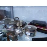 TWO SILVER PLATED VEGETABLE TUREENS, A PLATED TABLE LIGHTER, SILVER TEA SPOONS, ETC.