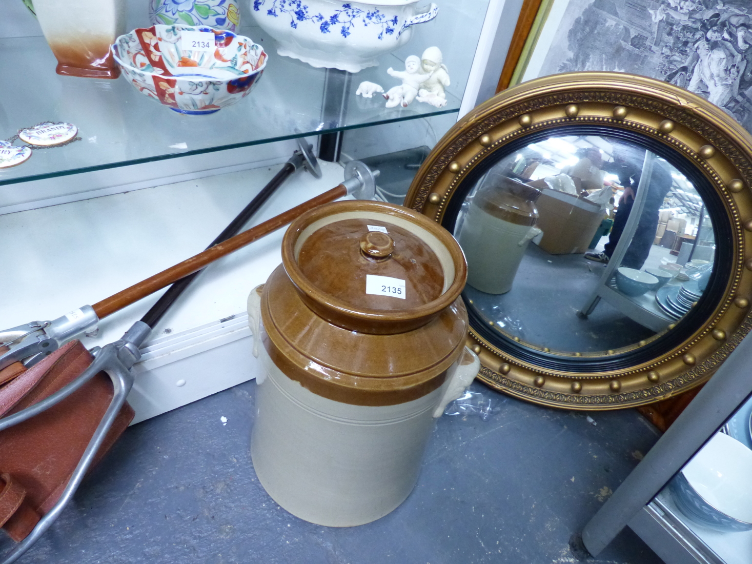 A VICTORIAN MAPLE FRAMED PRINT, CONVEX MIRROR, TWO SHOOTING STICKS AND A LIDDED STORAGE JAR.