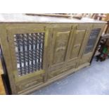 A LARGE INDIAN BRASS DECORATED SIDE CABINET.