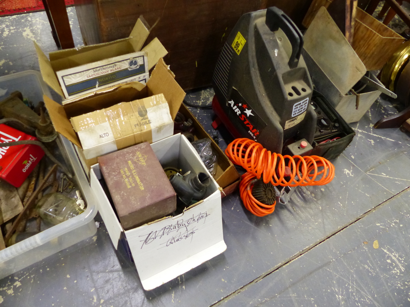 A COMPRESSOR AND VARIOUS TOOLS.