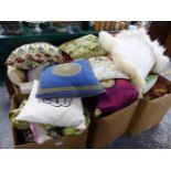 A LARGE COLLECTION OF VARIOUS DECORATIVE CUSHIONS OF DIFFERENT SIZES AND PATTERNS.