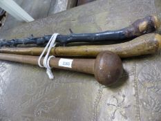 A KNOBKERRIE AND TWO WALKING STICKS.