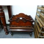 A 19TH C. MAHOGANY THREE DIVISION CANTERBURY WITH OGEE BASE DRAWER.