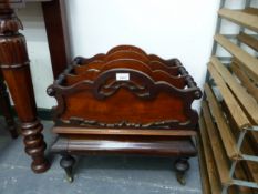 A 19TH C. MAHOGANY THREE DIVISION CANTERBURY WITH OGEE BASE DRAWER.