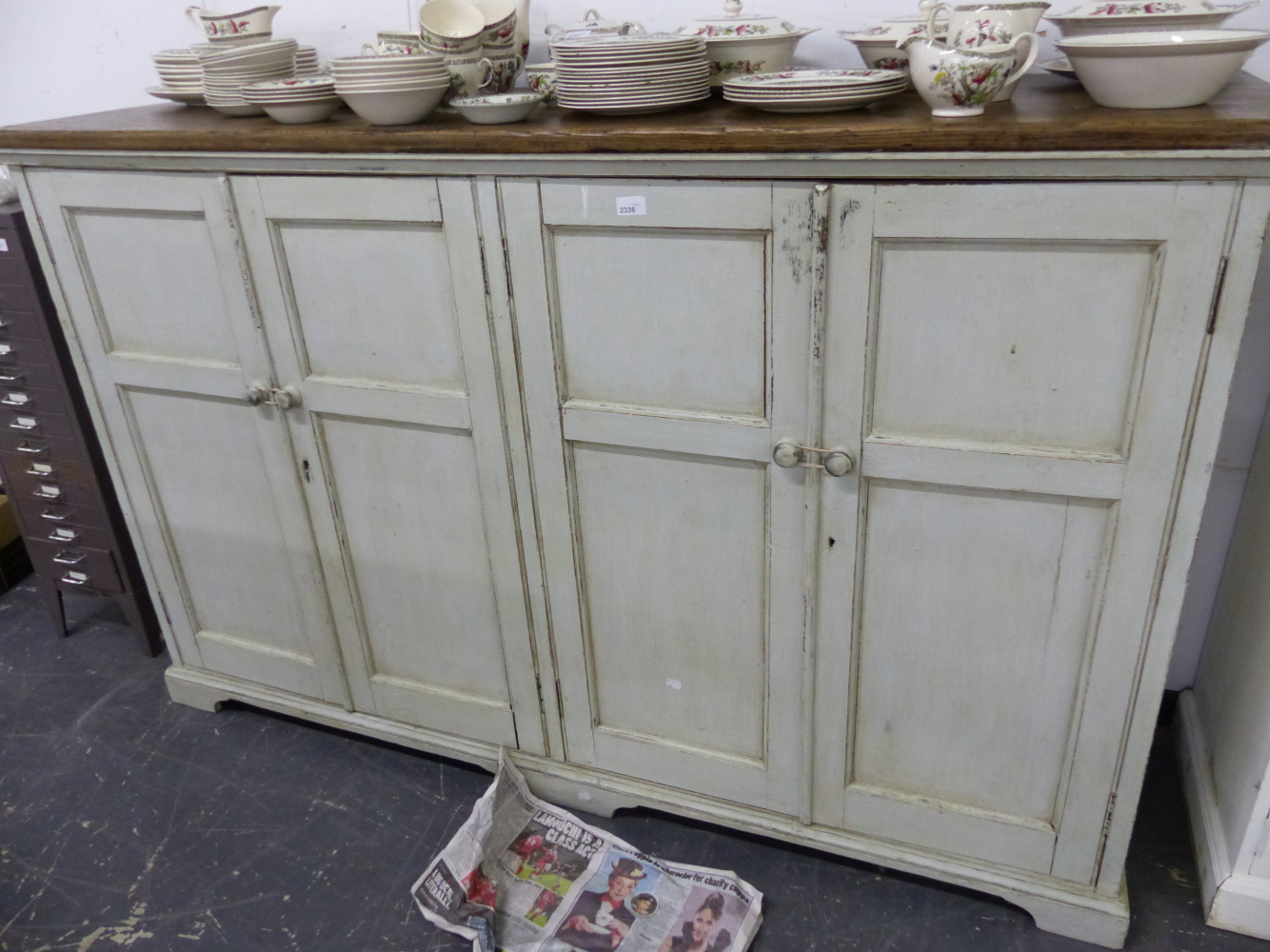 A LARGE PAINTED OAK FOUR DOOR SIDE CABINET.