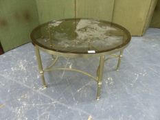 A CIRCULAR SMOKY GLASS TOPPED COFFEE TABLE WITH ANODIZED BRASS BASE, DIAMETER 77 X H 41CMS.