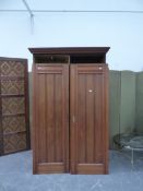 A LATE VICTORIAN COMPACTUM WARDROBE. W 126 X D 55 X APRROX 212CMS.