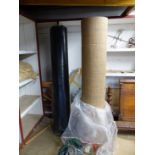 TWO UNUSED 2 METER ROLLS OF BLACK INDUSTRIAL OFFICE CARPET.