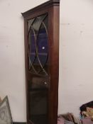 AN ANTIQUE MAHOGANY AND CHEQUER INLAID FLOOR STANDING CORNER CABINET. W. 79CM X D. 45CM X H. 225 CM