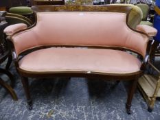 AN EDWARDIAN MAHOGANY AND INLAID SALON SETTEE W 125CMS.