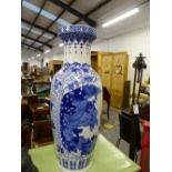 A LARGE ORIENTAL BLUE AND WHITE VASE. H 80CMS.