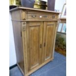 A CONTINENTAL ANTIQUE PINE TALL SIDE CABINET. W 101 X D 52 X H 134CMS.