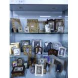A LARGE QUANTITY OF VINTAGE STYLE PHOTO FRAMES.