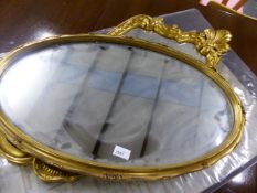 TWO VICTORIAN STYLE GILT FRAMED MIRRORS. OVAL MIRROR 71 X 43CMS, SHAPED MIRROR 81 X 46CMS.