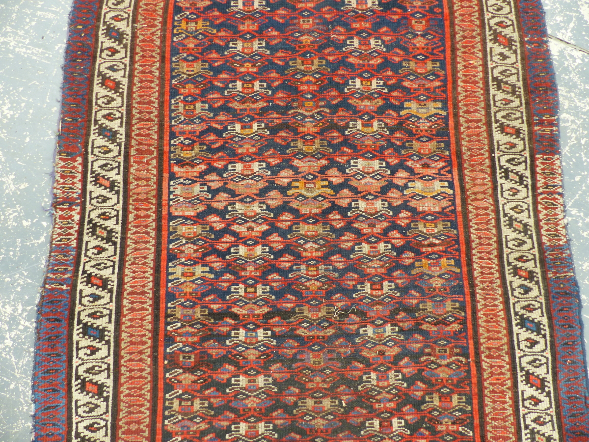 AN ANTIQUE PERSIAN TRIBAL RUNNER, 430 X 115cm. - Image 11 of 22