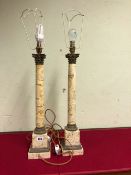 A PAIR OF CORINTHIAN COLUMN CANDLESTICK TABLE LAMPS IN COLD CAST BRONZE AND SIMULATED TUFA. H