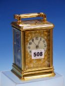 A CARRIAGE CLOCK IN GLAZED BEADED CASE STRIKING AND REPEATING ON A COILED ROD, THE DIAL WITH