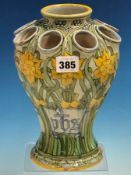 A CANTAGALLI BALUSTER DAFFODIL VASE, CIRCA 1900, THE YELLOW EDGED RIM CENTRAL TO EIGHT FURTHER