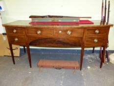 AN INLAID MAHOGANY GEORGE III BOWFRONT SIDEBOARD, TWO CENTRAL LONG DRAWERS FLANKED BY DEEP BOTTLE