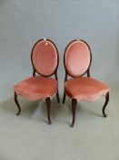 A PAIR OF CARVED MAHOGANY ANTIQUE SALON CHAIRS IN FRENCH HEPPLEWHITE STYLE.