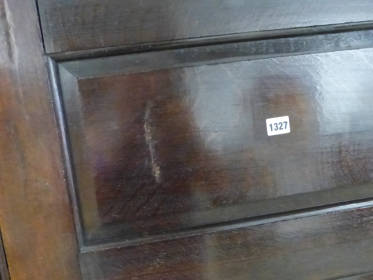 AN 18th C. OAK CUPBOARD WITH THE THREE PANELLED DOOR ENCLOSING HANGING SPACE ABOVE A SHELF AND THE - Image 4 of 10