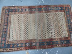 AN ANTIQUE PERSIAN TRIBAL RUG, 175 X 102cm, TOGETHER WITH A CAUCASIAN FRAGMENT (2).