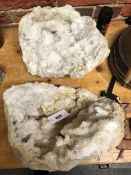 A QUARTZ GEODE IN TWO HALVES. W 36cms.