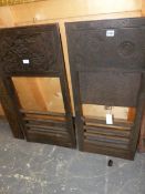 TWO ARTS AND CRAFTS CAST IRON FIRE SURROUNDS BY THOMAS JEKYLL, TOGETHER WITH ANOTHER CAST WITH