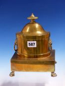 A BRASS TWO HANDLED TOBACCO BOX, LEAD WEIGHT AND DOMED OVAL LID, THE RECTANGULAR BASE WITH A