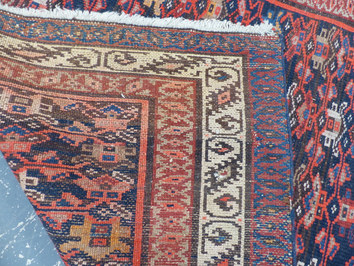 AN ANTIQUE PERSIAN TRIBAL RUNNER, 430 X 115cm. - Image 17 of 22