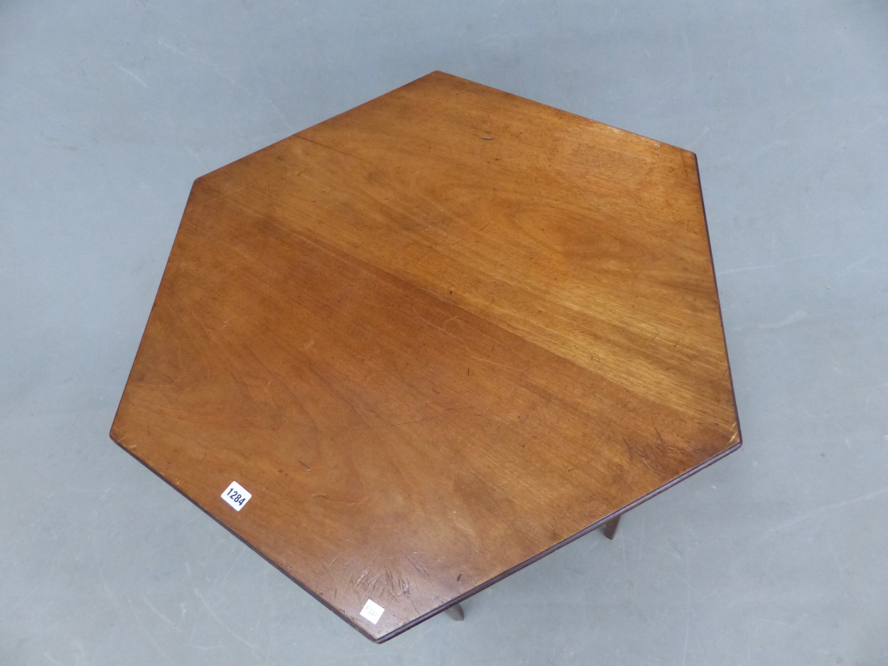 AN ARTS AND CRAFTS MAHOGANY HEXAGONAL TABLE, THE TAPERING SQUARE LEGS JOINED BY THREE BAR STRETCHERS - Image 2 of 3