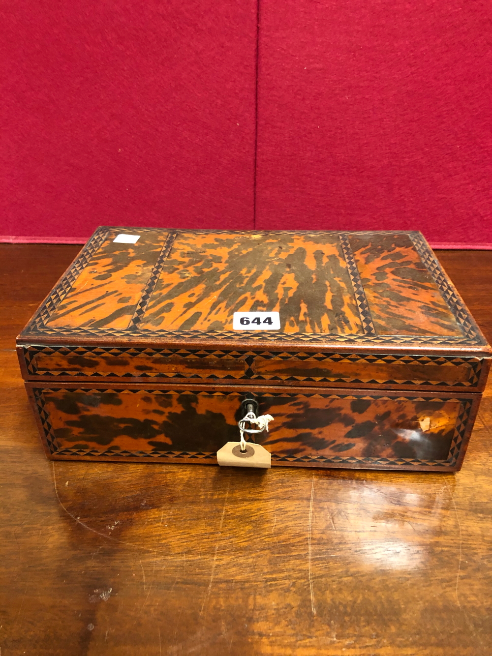 A 19th C. INDIAN TORTOISESHELL SPICE BOX, THE VENEERS ON THE RECTANGULAR LID DIVIDED BY EBONY AND