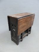 AN ARTS AND CRAFTS LIBERTY TYPE OAK DROP LEAF GATE LEG SMALL TABLE. 106 x 76 x 74cms H.